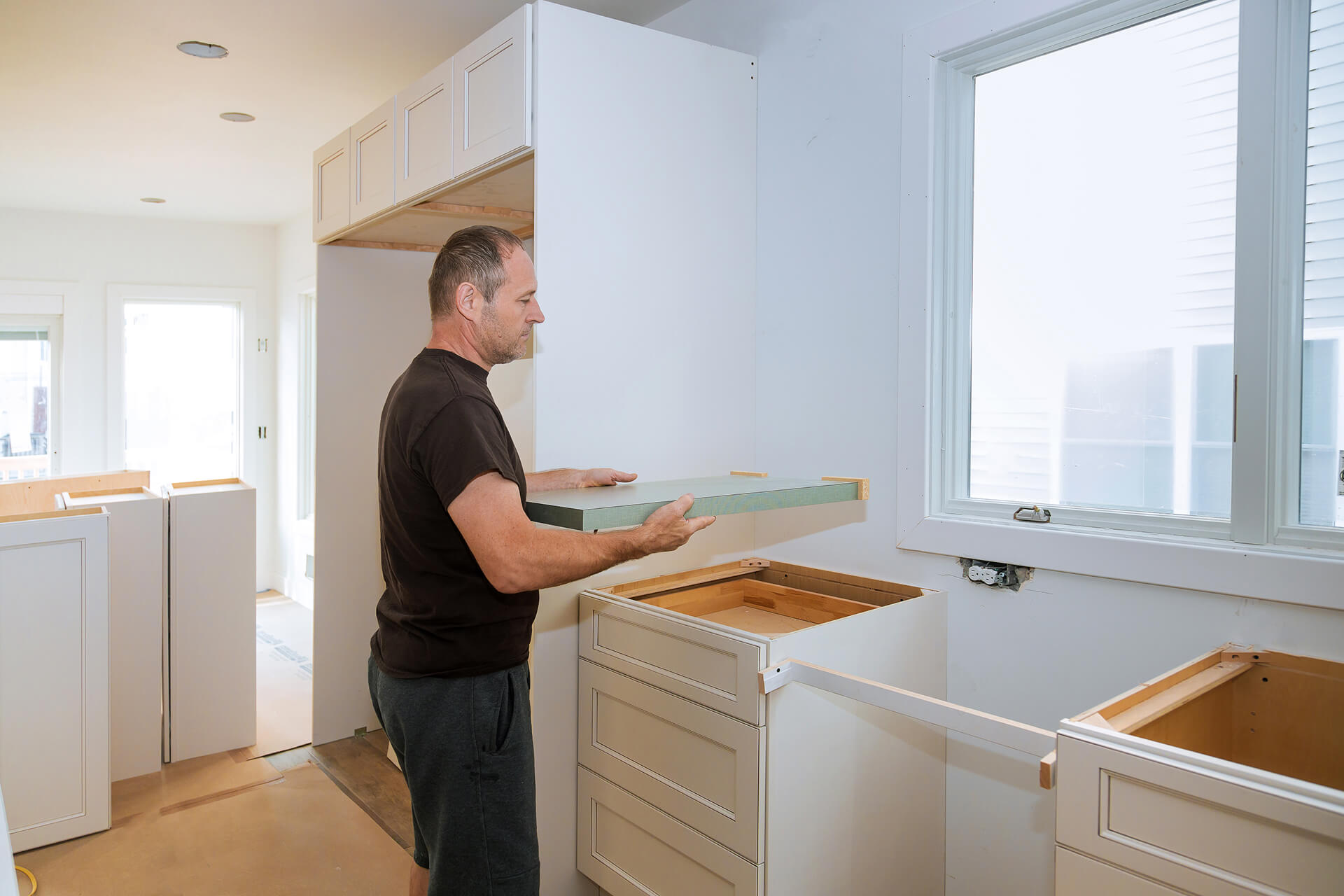 Installing contractors laminate counter top kitchen remodel